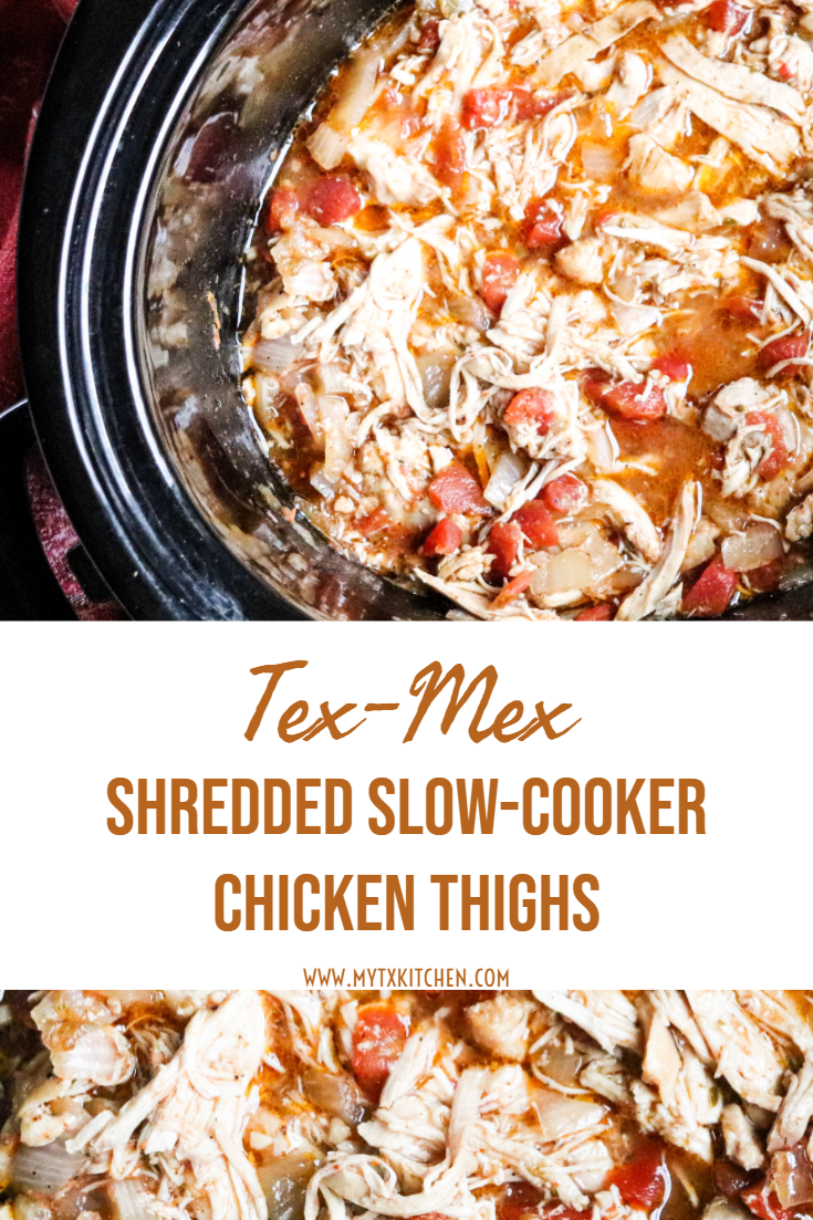 Chicken shredded in a crock-pot with tomatoes