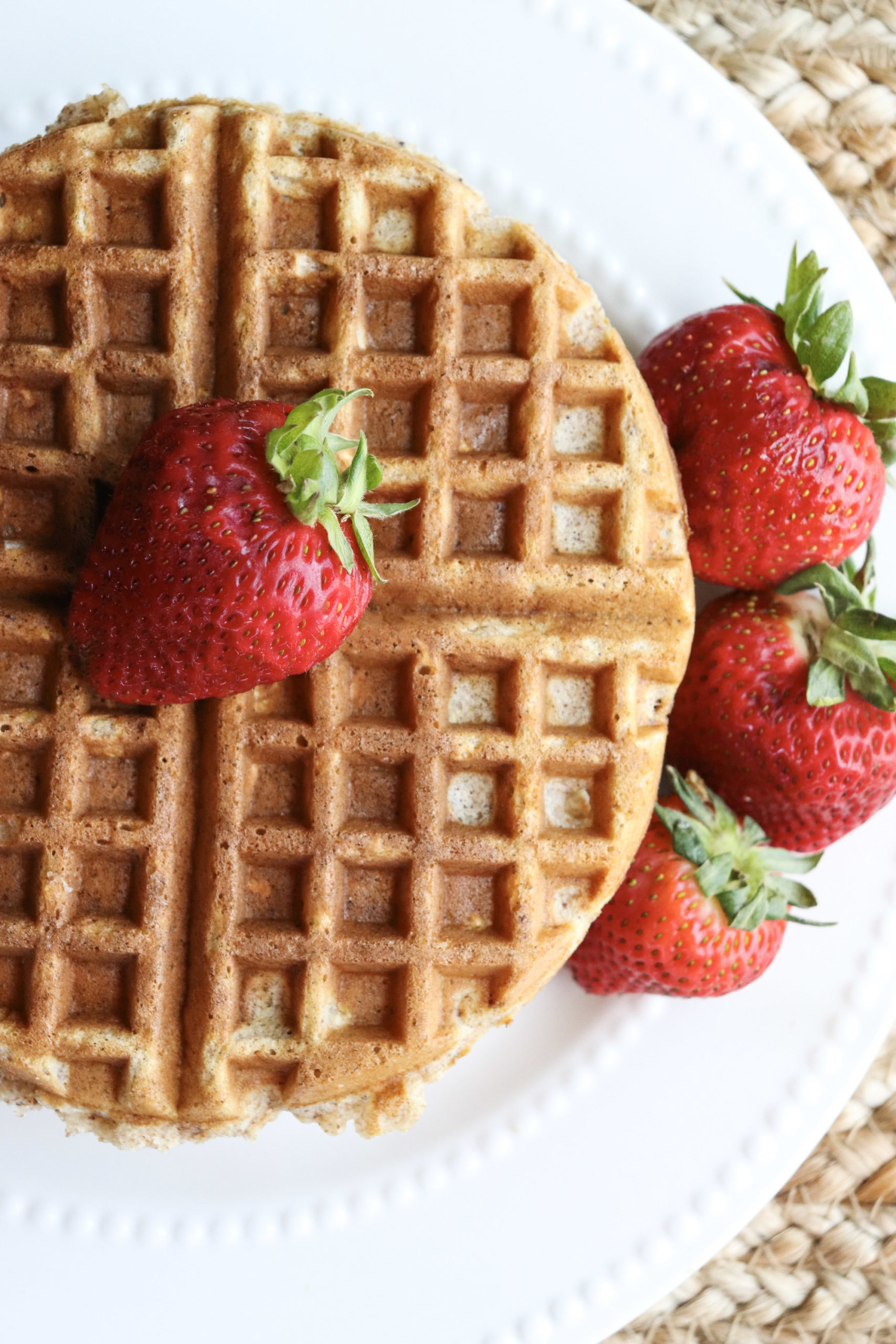 cooked waffle with strawberries