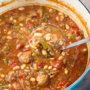 dutch oven with cooked pork green Chile stew