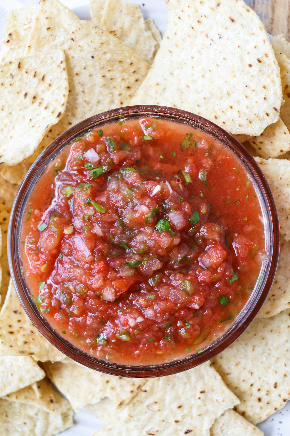 closeup of prepared salsa in a bowl with tortilla chips