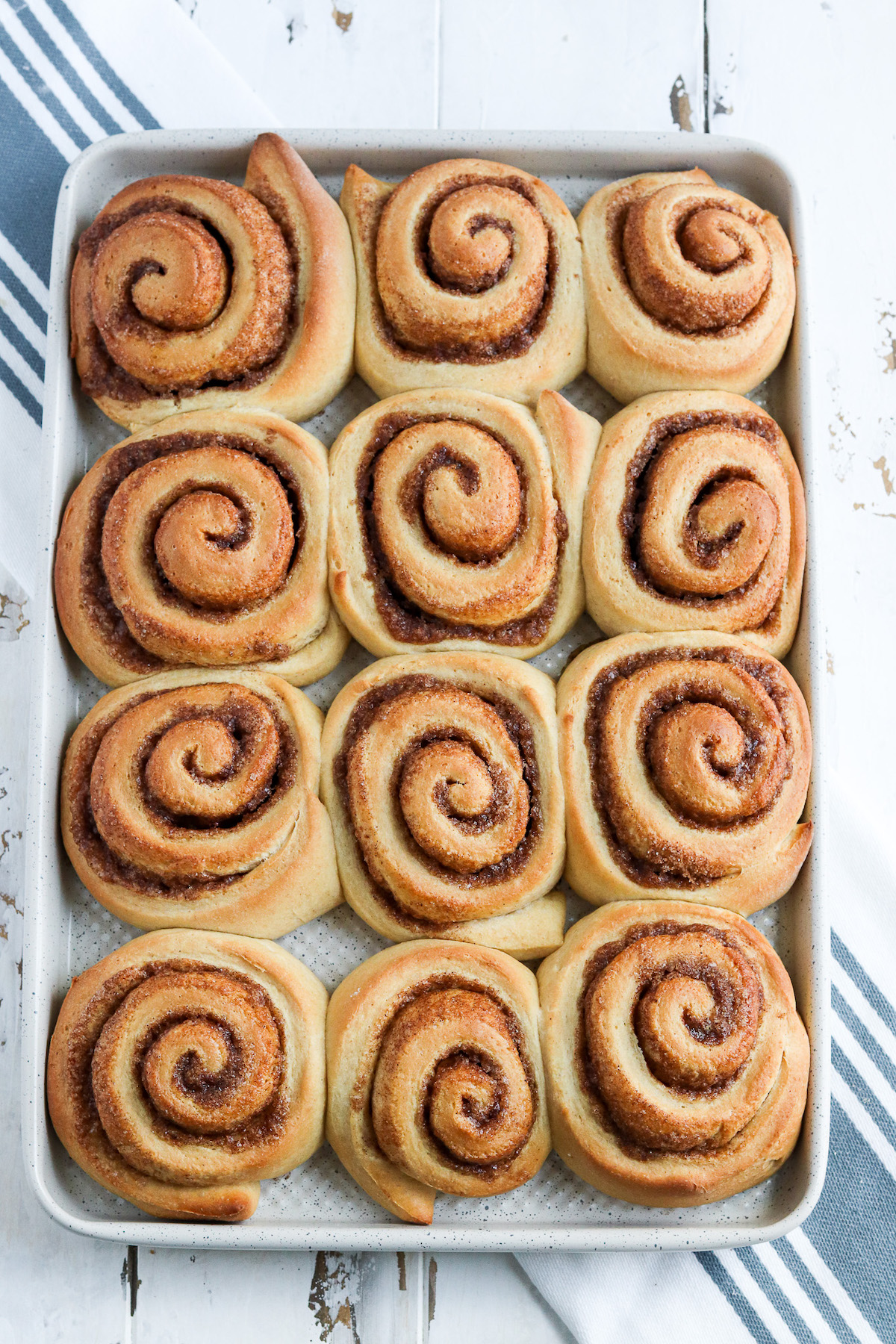 a dozen plain baked wheat cinnamon rolls