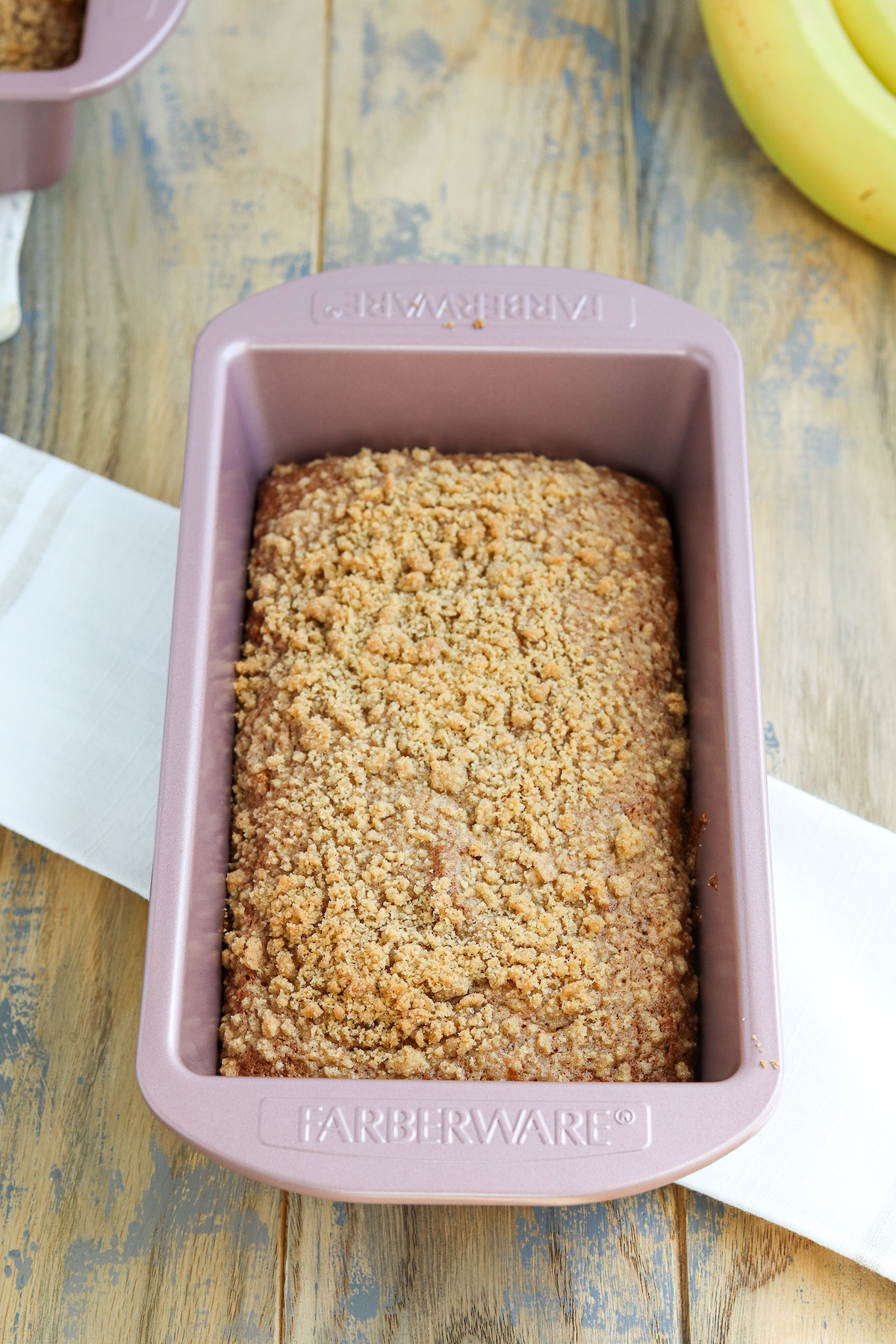 baked banana bread with a golden brown streusel topping