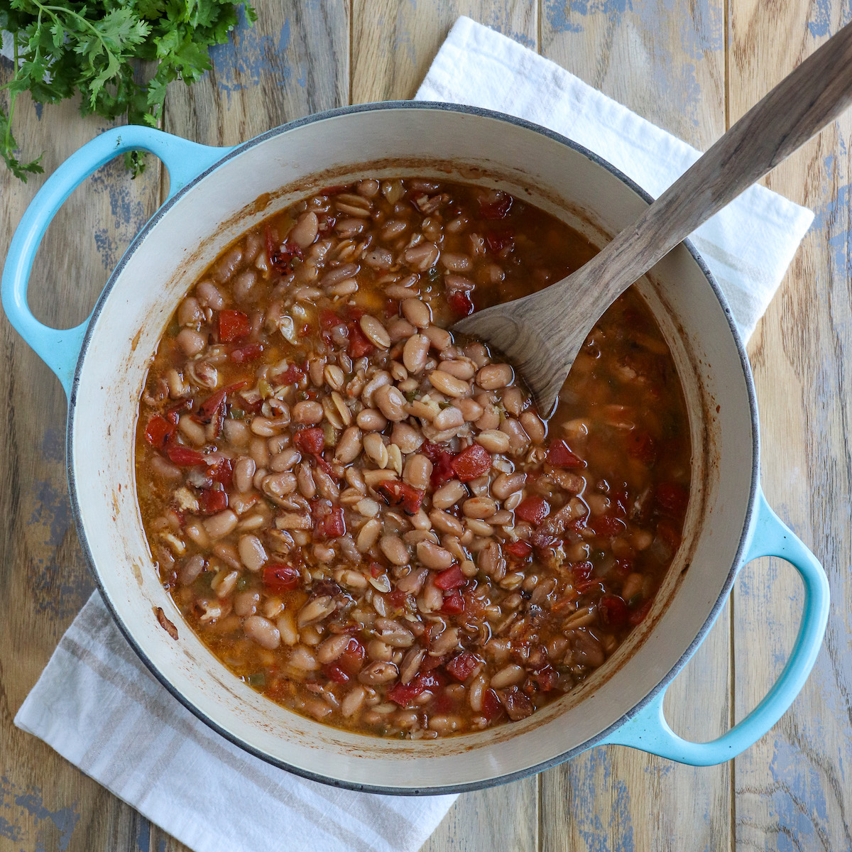 dutch oven with cooked Mexican pinto beans