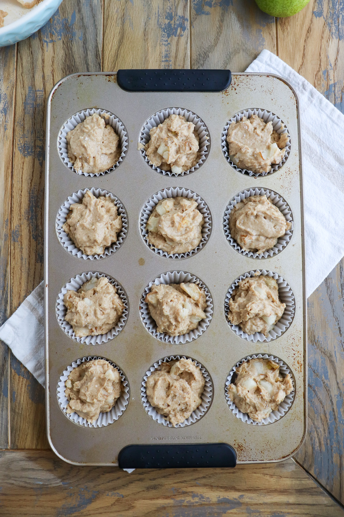 muffin tin with batter