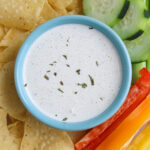 closeup of creamy jalapeno ranch garnished with extra parsley