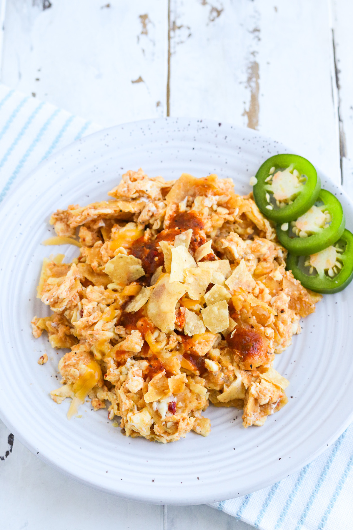 plate of cooked migas with jalapeno garnish