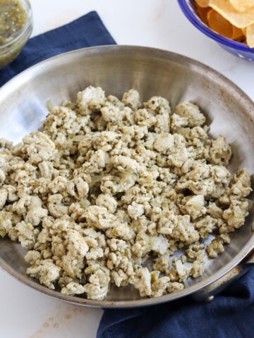 visible green salsa verde and cooked ground turkey meat