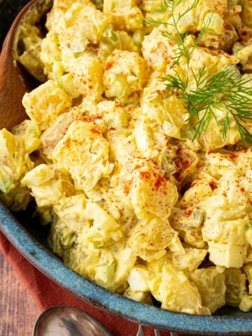 diced gold potatoes, celery tossed in creamy mustard dressing with paprika
