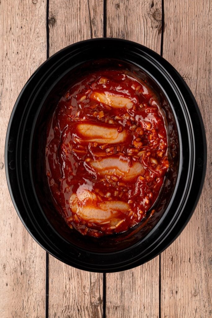 chicken breast and homemade bbq sauce in crock pot