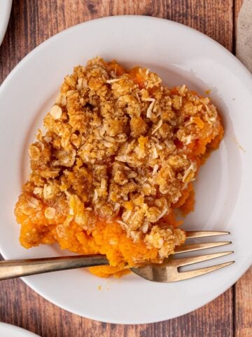 a serving of the best southern sweet potato casserole with crispy oat streusel topping