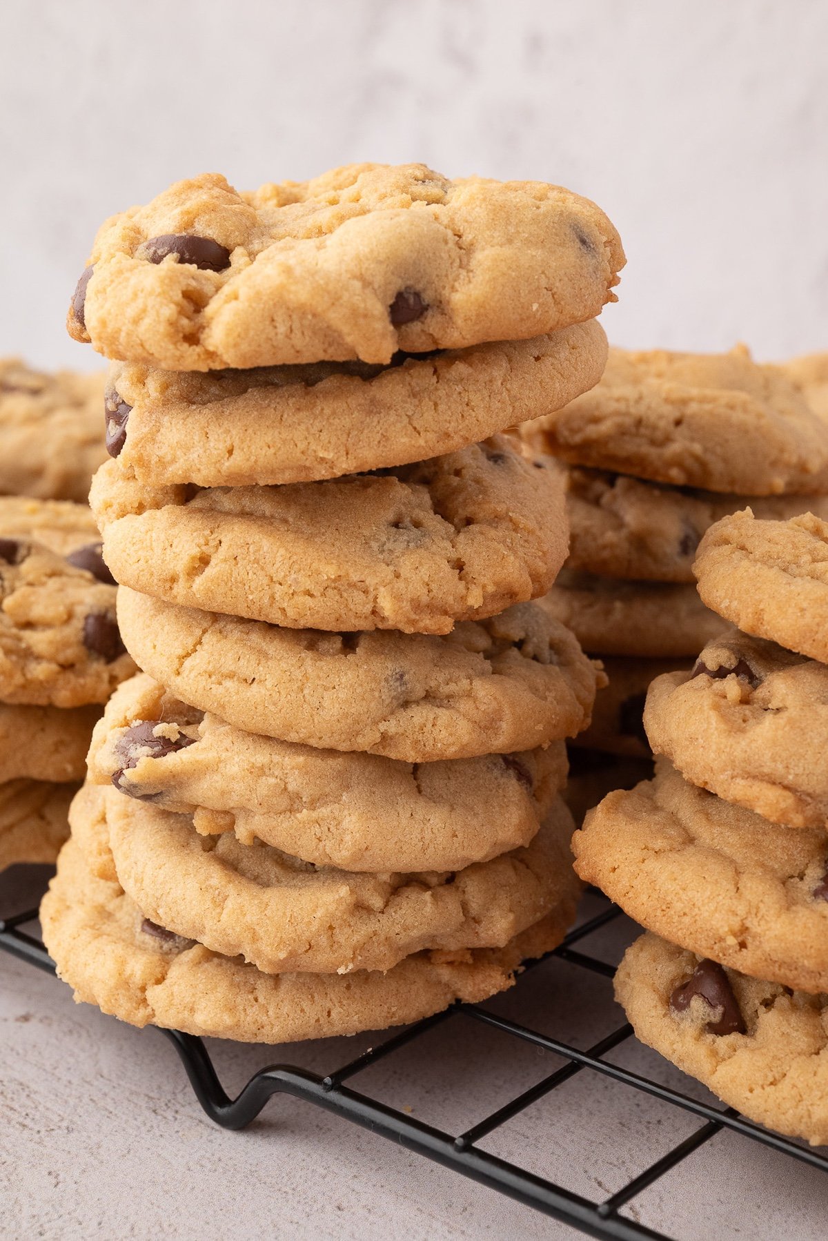 stacks of baked peanut butter and chocolate chip cookies