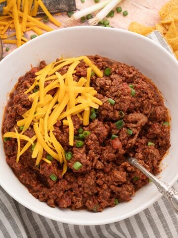 thick Texas style chili with no beans to be served with Fritos and cheese