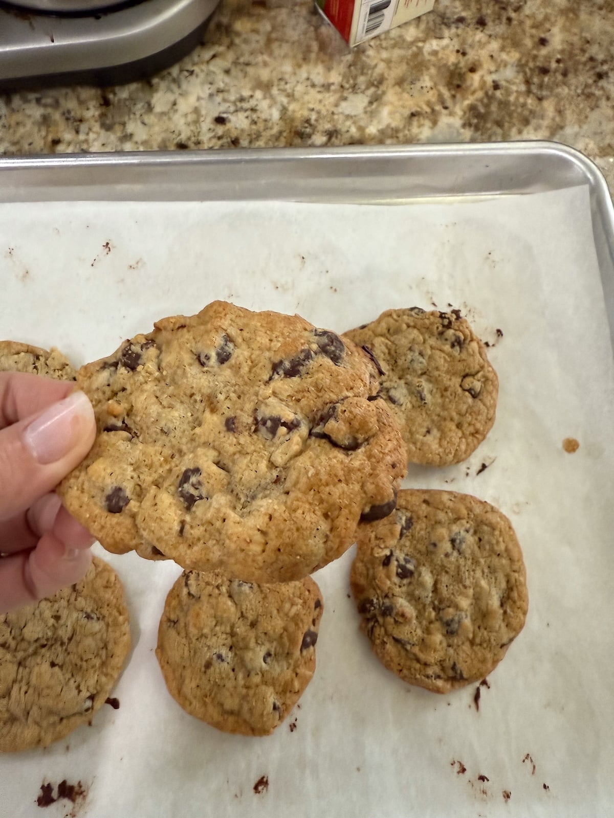 Alaine Motley, RD, testing a batch of cookies in her kitchen to ensure recipe accuracy.