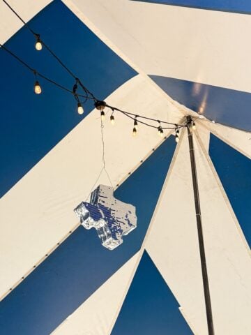 Live music under big tent next to Zapp Hall in Warrenton, Texas, during the Spring Antiques Show.