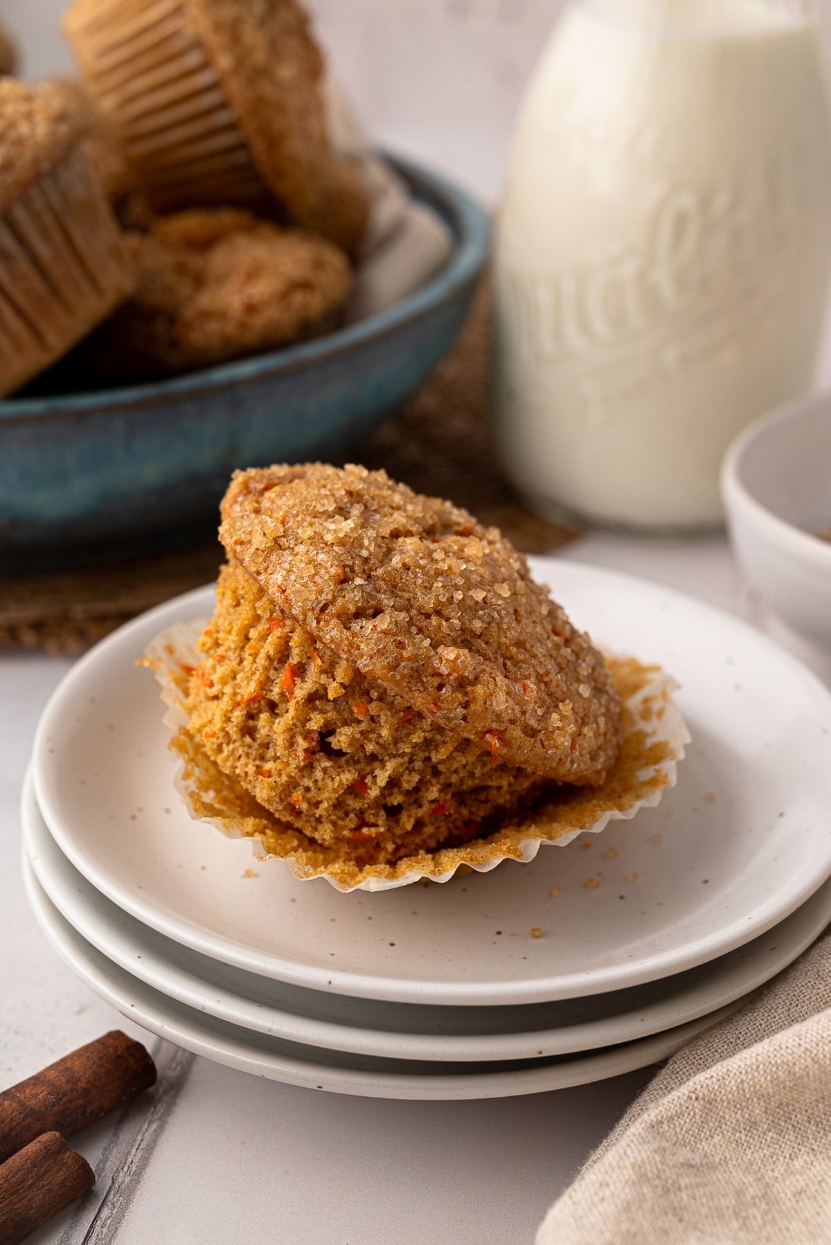 Freshly baked "My Texas Kitchen" carrot muffins made with white whole wheat flour and topped with a sweet, crunchy turbinado sugar finish.