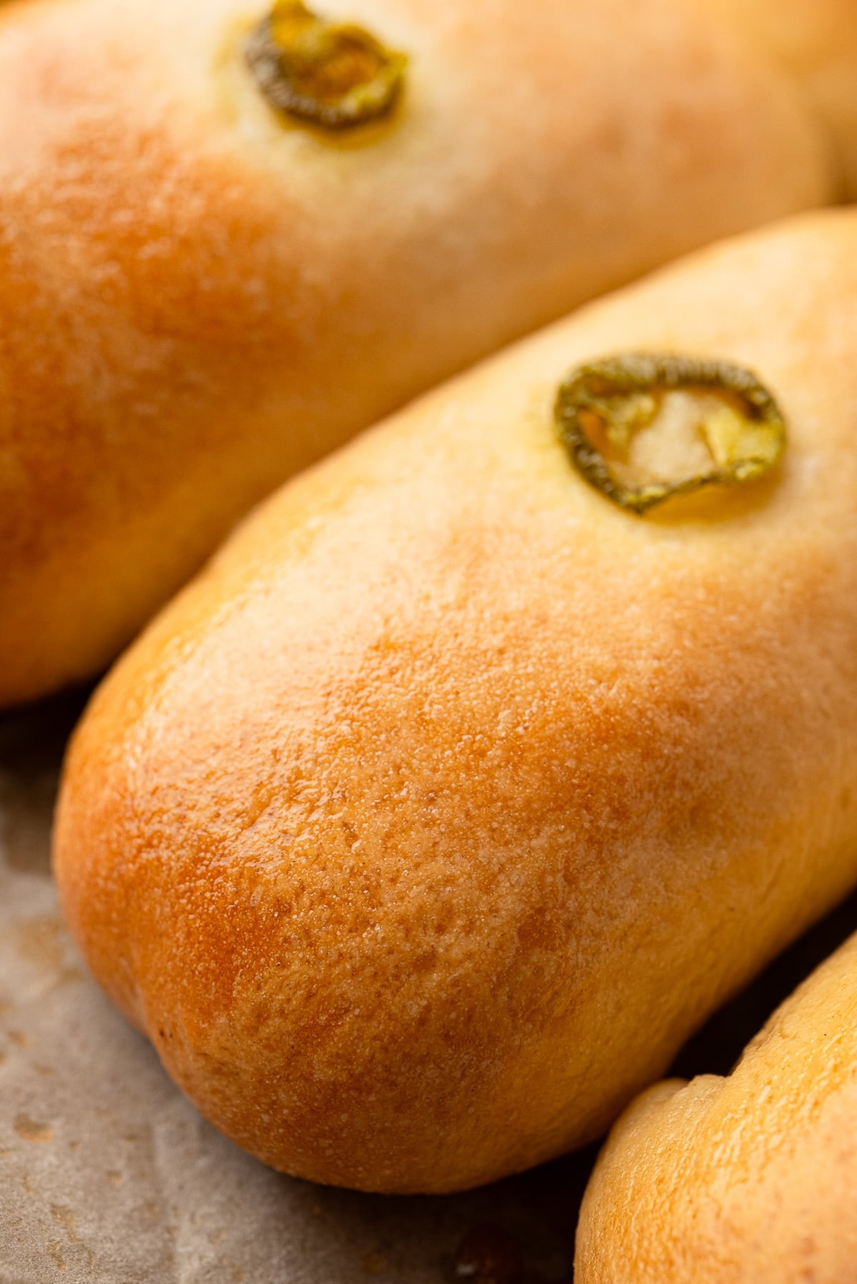 Closeup showing the golden brown jalapeno sausage klobasnek.